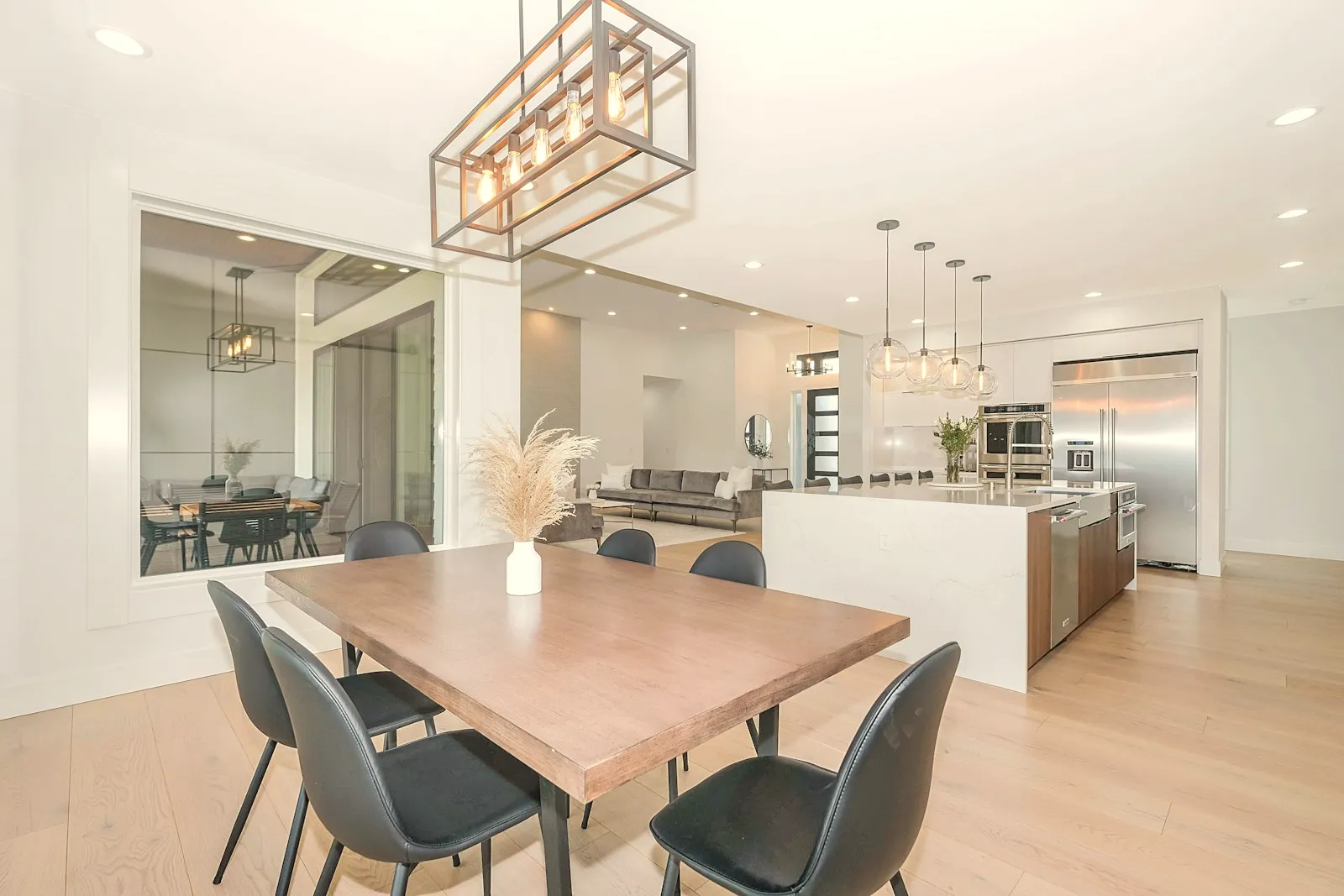 Dining area beside an open kitchen