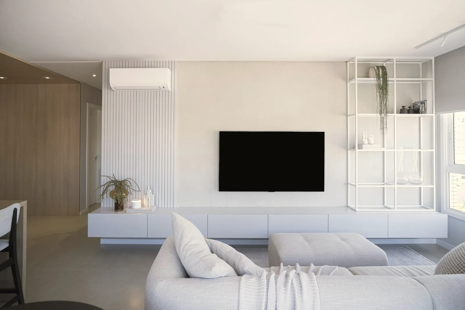 Minimal living room with TV wall