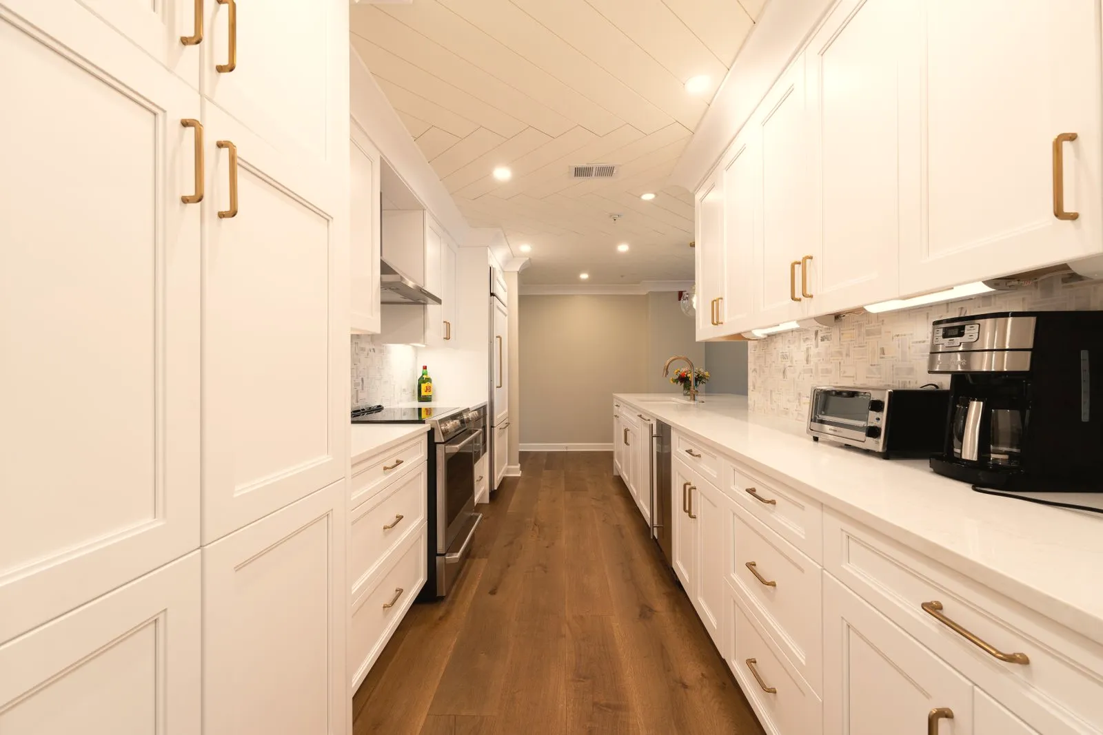 Parallel galley kitchen with cabinets on both sides